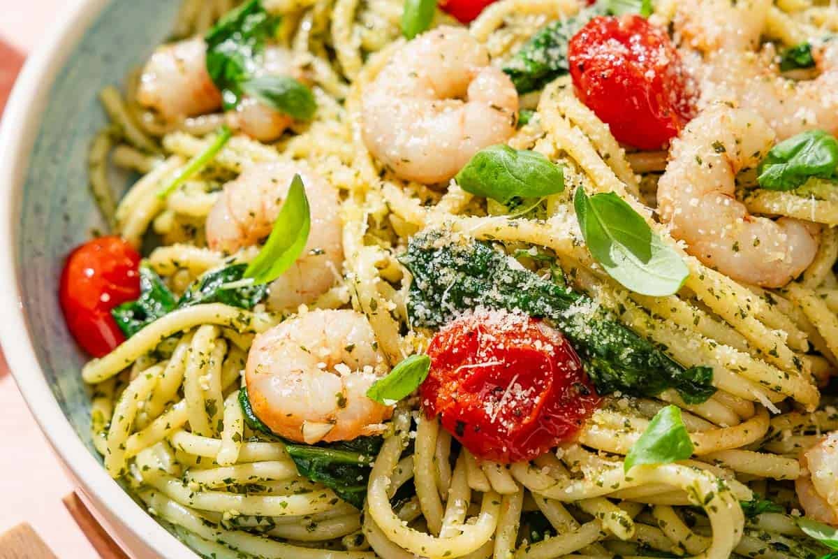 Shrimp pesto pasta in a serving bowl.
