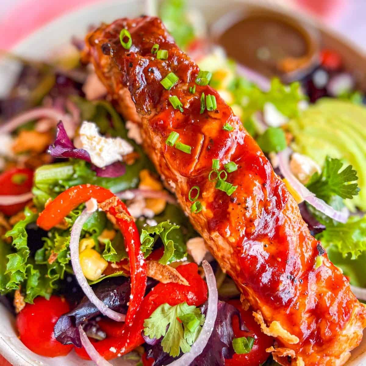 Grilled Salmon on a Salad.