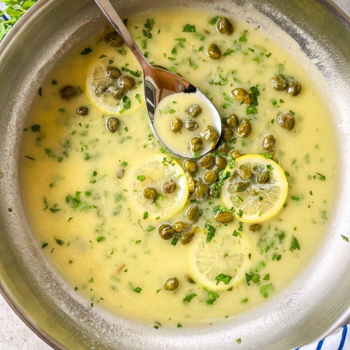 Piccata sauce in a pan.