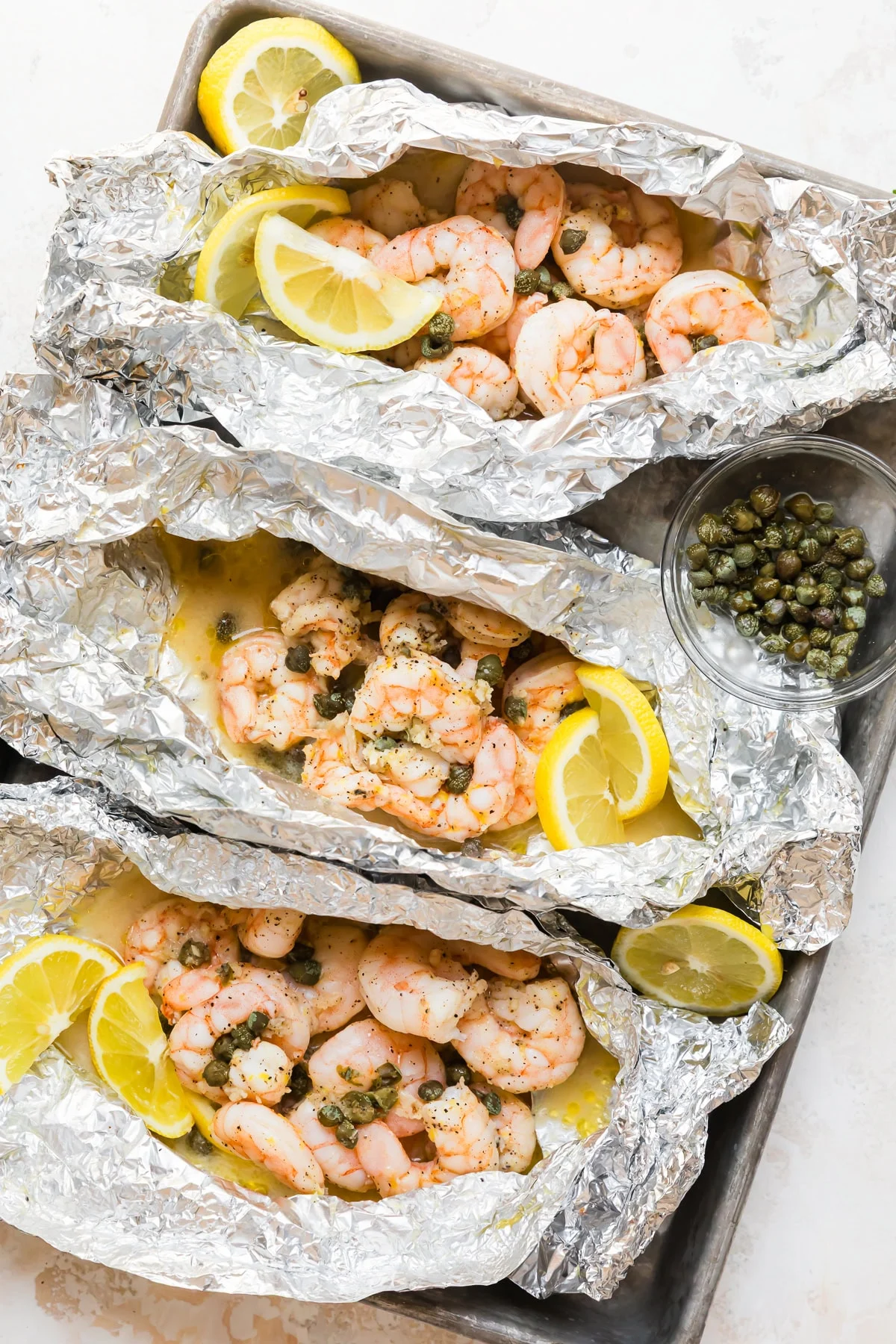 Piccata de crevettes en papillote